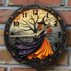 May include: A round wall clock with a witch design. The clock face features a witch in a purple and orange dress, a tree, and a bat. The clock has black hands and a black frame with decorative leaves.