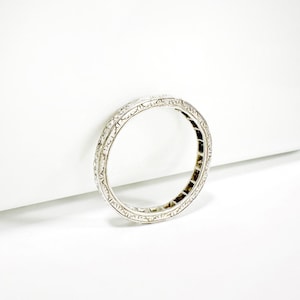 Vintage diamond wedding band in platinum