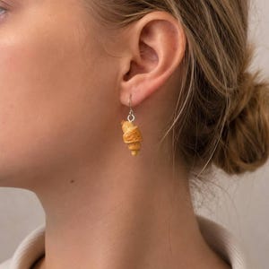 croissant dangle earrings