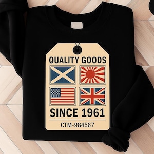 May include: Black sweatshirt with a tag design displaying "QUALITY GOODS SINCE 1961." The tag includes flags of Scotland, Japan, the United States, and the United Kingdom. The tag also has the text "CTM-984567."