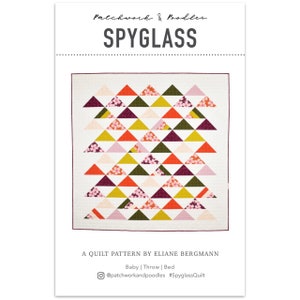May include: A quilt pattern called "Spyglass" by Eliane Bergmann. The pattern features a geometric design of colorful triangles with a floral print. The quilt is available in baby, throw, and bed sizes. The pattern is available on the website patchworkandpoodles.com and on Instagram @patchworkandpoodles. #SpyglassQuilt