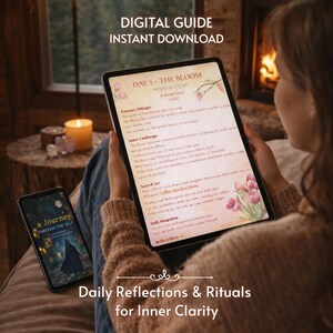 May include: A person holds a tablet displaying a digital guide titled "Day 3 - The Bloom" with floral illustrations. A smartphone with the book cover "a Journey Through The Self" is also visible. The image includes the text "Digital Guide Instant Download" and "Daily Reflections & Rituals for Inner Clarity".