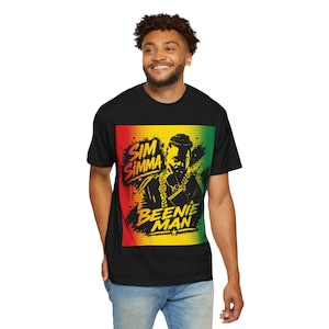 May include: Black t-shirt with a graphic of Beenie Man, the text "Sim Simma" and "Beenie Man" in red, yellow, and green. The design has a halftone effect and a reggae colour scheme.