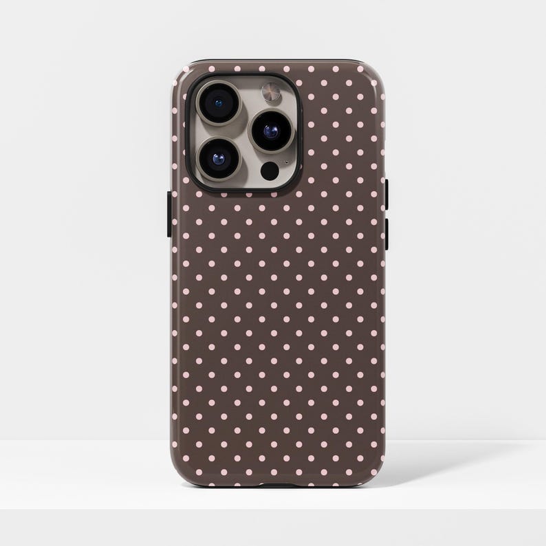 Add a playful retro charm to your device with our Pink & Brown Polka Dot Case, a cute and trendy aesthetic design perfect for everyday style. The soft pink and warm brown dots create a balanced look that’s both fun and chic, while the sturdy build keeps your phone safe from scratches and drops. Ideal for fashion lovers who adore simple yet stylish patterns, it’s compatible with iPhone 17, 16, 15, 14, 13, 12, 11 Pro Max and Samsung Galaxy S23, S22, S21, S20 Ultra.
