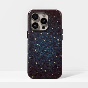 May include: A smartphone case with a dark blue and brown swirling pattern, featuring yellow stars. The case has a glossy finish and a camera cutout with three lenses.