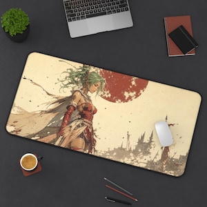 May include: A rectangular mouse pad featuring a fantasy illustration of a woman with green hair and red attire, set against a red sun and a landscape. The pad is on a black surface with a laptop, a plant, and a coffee cup.