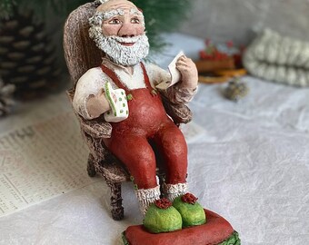 Santa Claus figurine paper mache Christmas decor handmade holiday decoration under tree fireplace shelf