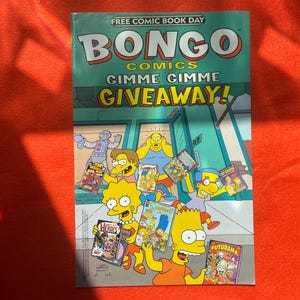 May include: A comic book cover for Free Comic Book Day featuring the Bongo Comics characters. The cover has the text "Bongo Comics Gimme Gimme Giveaway!" and features several characters from The Simpsons and Futurama.