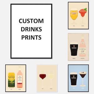 May include: A selection of framed art prints showcasing drinks illustrations. The prints depict beer, cocktails, wine, and Guinness. The text "CUSTOM DRINKS PRINTS" is displayed on a large white framed print.