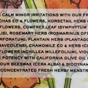 May include: Text on a floral background lists ingredients for a skincare product. Ingredients include Lavandula Vera, Calendula Officinalis Flowers, Comfrey Leaf, and California Olive Oil. The text promotes healthy skin and calming minor irritations.