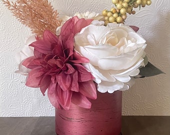 Faux flower arrangement/centerpiece in shimmery cranberry distressed vase