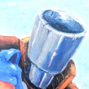 May include: An abstract painting featuring a large, metallic blue cylindrical object with silver highlights. The artwork has a textured, painted appearance, with a light blue sky background and hints of orange and yellow.