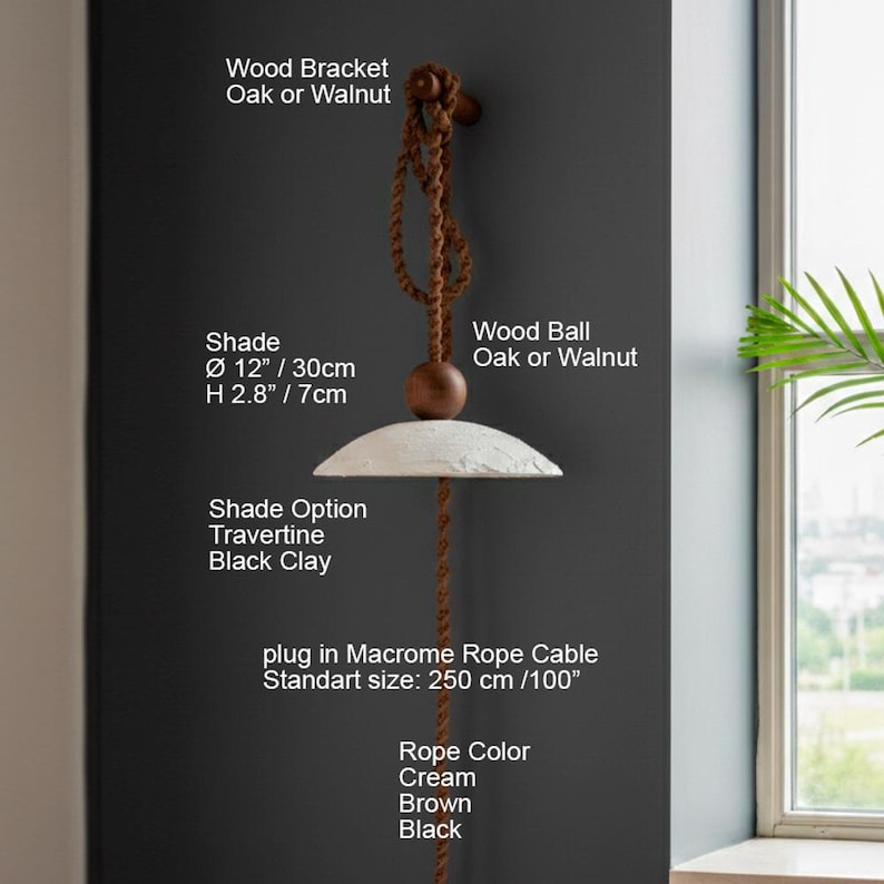 May include: A hanging lamp with a cream-colored shade, 12 inches in diameter and 2.8 inches high, suspended by a brown macrame rope. The lamp features a wooden bracket and ball, with options for travertine or black clay shades. The rope is 100 inches long.