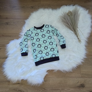 Long-sleeved shirt, sweater size 104