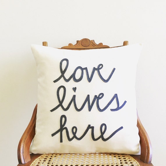 Items similar to love lives here pillow cover, housewarming gift