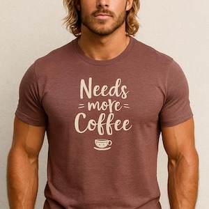 Needs More Coffee T-Shirt – Funny Unisex Tee – Coffee Lover Shirt – Morning Mood Gift – Brown Cotton Graphic Tee