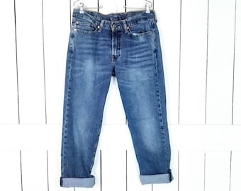 Levis 514 faded straight leg blue denim jeans/blue jeans/faded Levi Strauss jeans/waist 34"