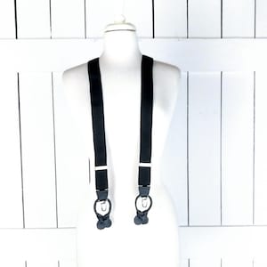 Black stretch silver clip tab suspenders