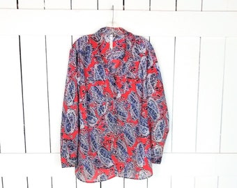 May include: A red and blue paisley patterned long-sleeved shirt with a button-up front.