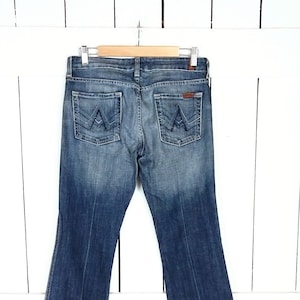 7 for all mankind blue denim faded boot cut/flare jeans/28