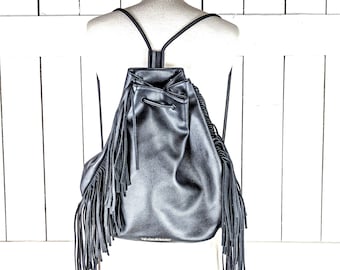 Victoria's Secret black faux leather tassel fringe drawstring purse backpack