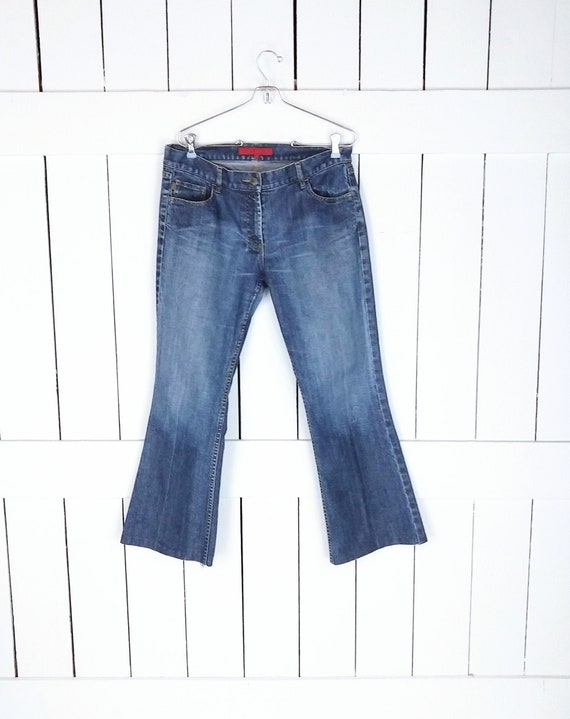 Faded blue jeans with silver studs