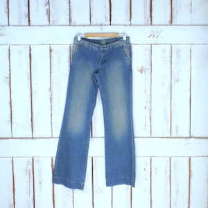 90s faded blue boot cut/slight flare low rise denim jeans/waist 31&quot;