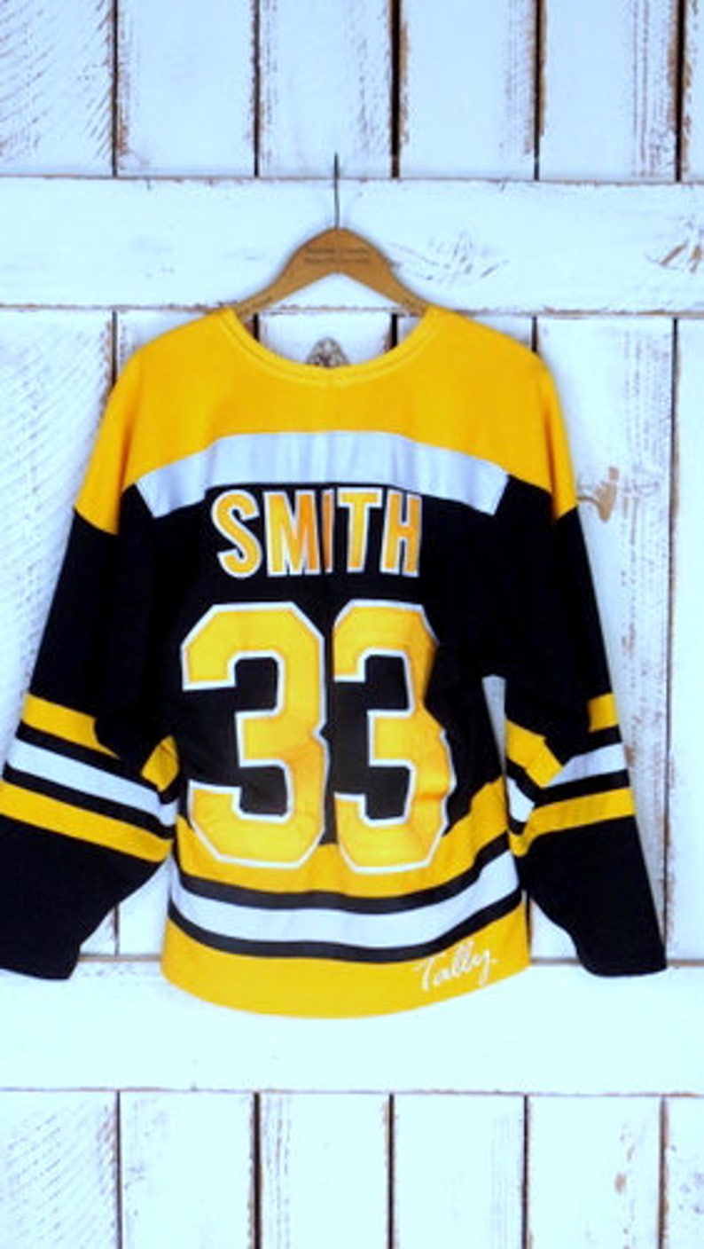 Vintage blackyellow jaguarleopard athletic sports jerseystriped team jerseySmith 33 jersey