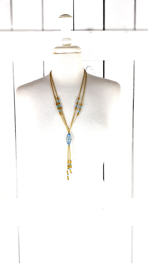 Gold blue beaded layered long laureate necklace