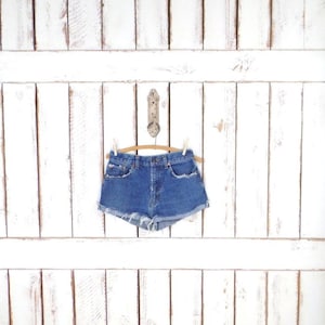 Vintage Levis 501 high waist cut off denim shorts/raw hem cuffed jean shorts/frayed Levis daisy dukes/waist 27&quot;
