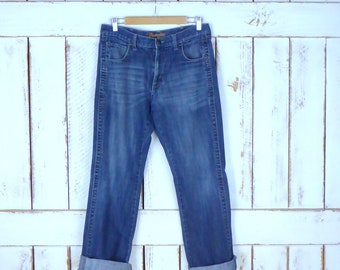 Wrangler boot cut blue denim jeans/90s boot cut blue jeans/mid rise jeans/waist 33"