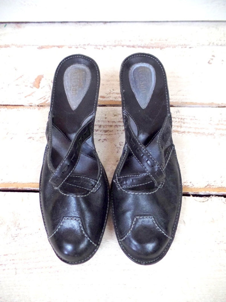 black leather high heel mules