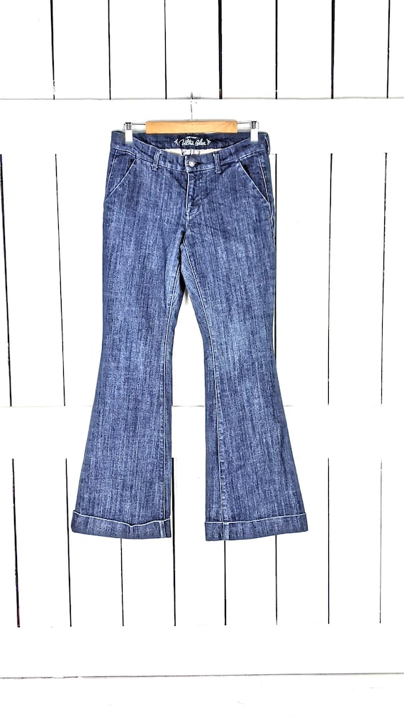 Dark blue wash stretch cuffed flare denim jeans