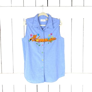 Blue cotton denim sleeveless embroidered dog floral collared shirt