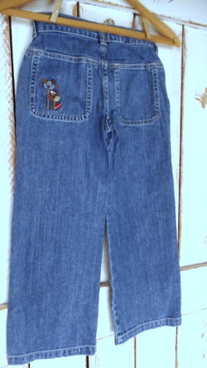 Kidsgirlschildrens loose wide leg floral embroidered fadeddistressed blue denim jeansOsh Kosh BGosh7