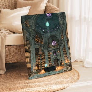 May include: A rectangular canvas print depicting a grand, stone-walled library interior with high vaulted ceilings, tall bookshelves, a glowing blue orb, and flickering orange flames on the floor beneath a large, circular purple stained-glass window.
