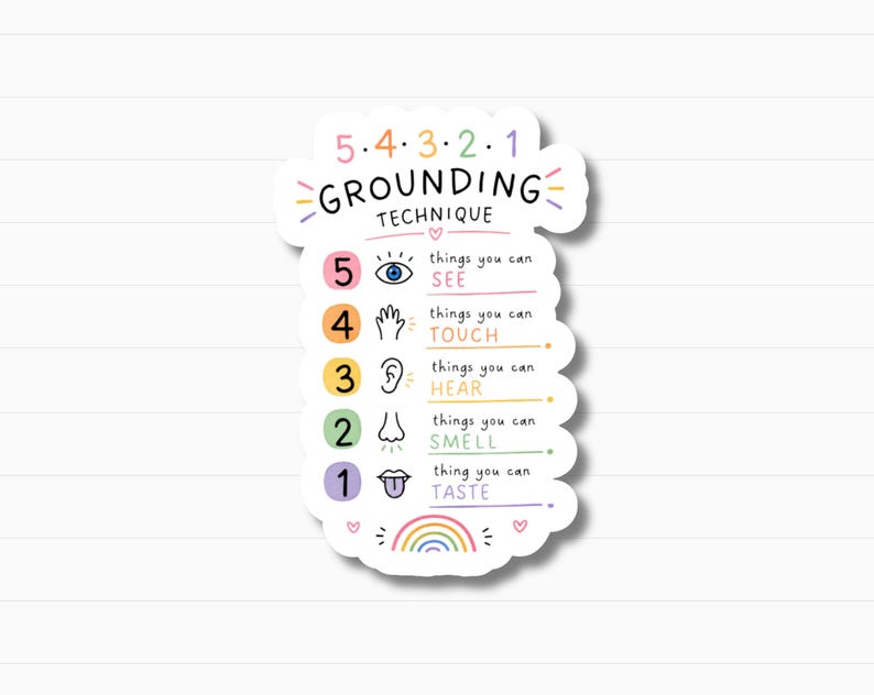May include: A white sticker featuring the text "5-4-3-2-1 GROUNDING TECHNIQUE" in a colorful design. It lists the five senses: see, touch, hear, smell, and taste, each with an icon. A rainbow and hearts are at the bottom of the sticker.