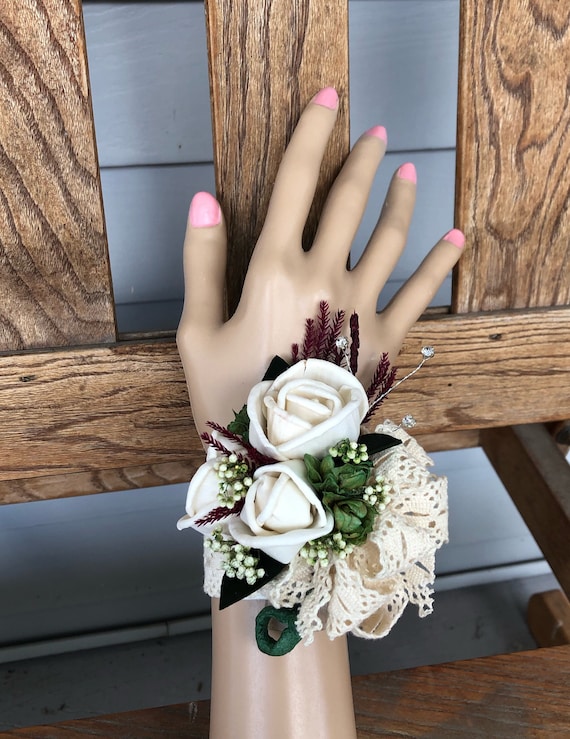 Sola wood rose wristlet corsage