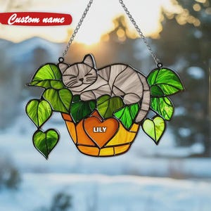 Atrapasueños acrílico con forma de gato naranja, decoración de vitrales falsos con maceta de hojas, regalo ideal para amantes de los gatitos.