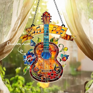 May include: A set of three ceramic mugs with a speckled, matte finish. The mugs are in shades of cream, light gray, and dark gray. Each mug has a simple, minimalist design and a rounded handle. The mugs are likely for coffee or tea.