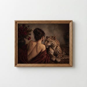 Leopard print showing a back-turned woman wrapped in burgundy fabric beside a reclining leopard in a dimly lit vintage interior.