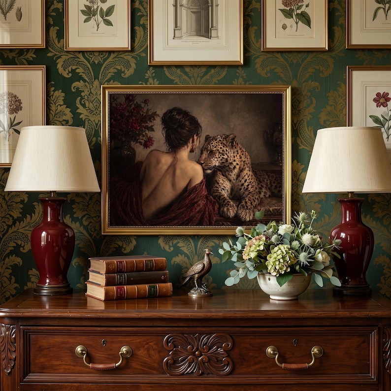 Leopard print showing a back-turned woman wrapped in burgundy fabric beside a reclining leopard in a dimly lit vintage interior.