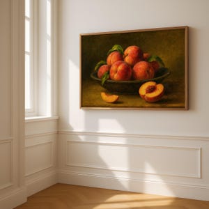Oil painting print of a bowl of ripe peaches with leaves, a sliced peach and peach wedge on a table, classical moody fruit still life kitchen wall art
