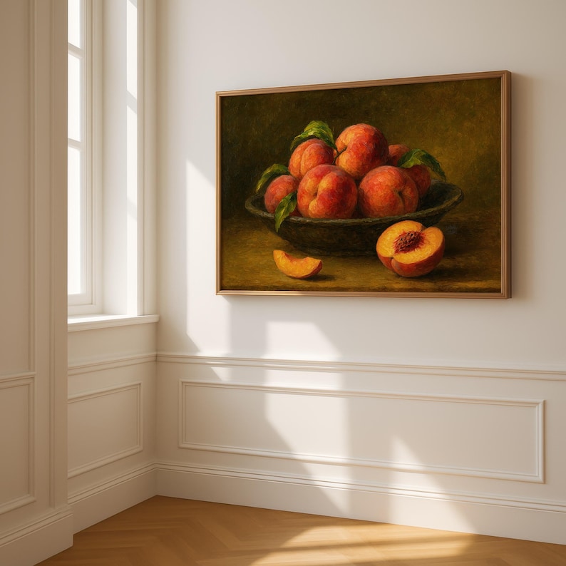 Oil painting print of a bowl of ripe peaches with leaves, a sliced peach and peach wedge on a table, classical moody fruit still life kitchen wall art