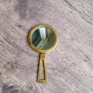 Vintage mässingsspegel: Swan Mark miniatyr sminkdekor