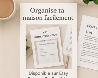 May include: A home organizer kit with the text "Organise ta maison facilement" and "Home Organizer" is displayed on a white background. The kit includes a checklist and a gold pen. A cup of coffee and a plant are also visible.