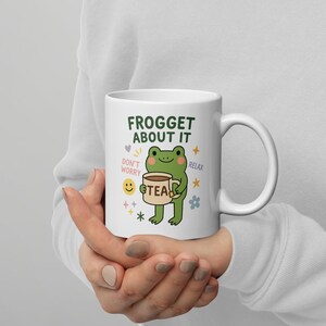 Frogget About It Mug – Cute Frog Tea Cup – Chill Vibe Frog Lover Gift – Punny Animal Design – Glossy Ceramic Relaxation Mug