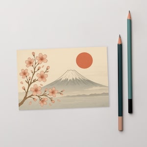 Impresión de postal del Monte Fuji: arte paisajístico japonés con flores de cerezo y sol rojo, escena natural minimalista
