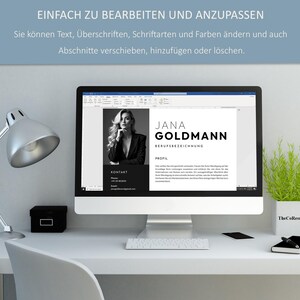 K&ouml;nnte beinhalten: Ein Computermonitor zeigt eine Lebenslaufvorlage mit dem Namen "JANA GOLDMANN" in fetter Schrift. Der Bildschirm zeigt auch den Text "EINFACH ZU BEARBEITEN UND ANZUPASSEN". Eine silberne Schreibtischlampe, eine kleine schwarze Box und eine Pflanze stehen auf dem wei&szlig;en Schreibtisch.