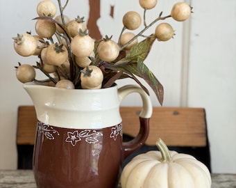 oxford stoneware pitcher, marked on bottom. brown and cream with flowers
